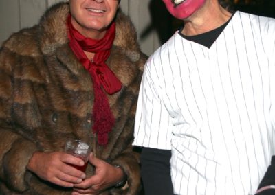 Two people dressed in costumes for Dunes Resorts Halloween 2021 party.