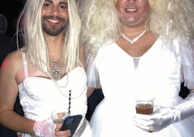 Two people dressed as brides for Dunes Resorts Halloween 2021 Party